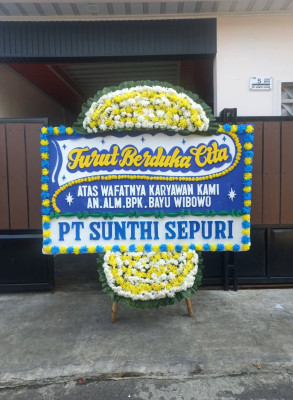 Papan Bunga Duka di Kebun Sayur