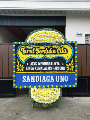 Papan Bunga Duka di Kebun Sayur